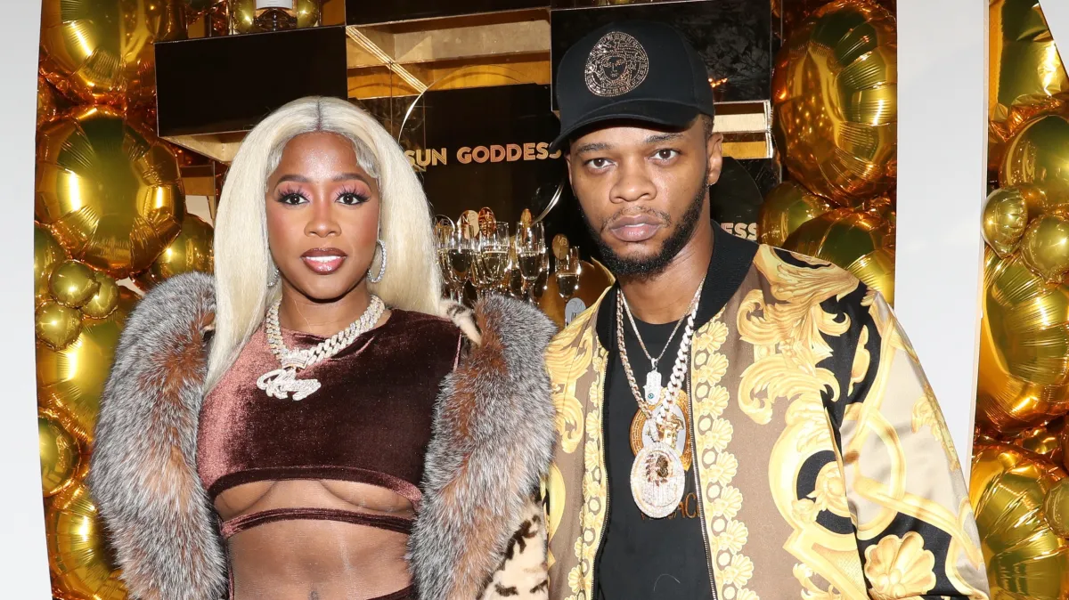 a man and woman posing for a picture Remy Ma Exposes Papoose's Alleged Affair with Boxer Claressa Shields miixtapechiick m